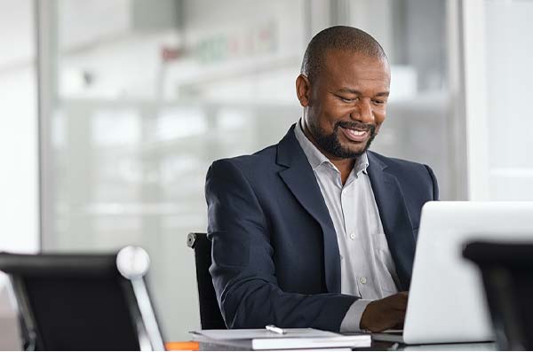 Man banking online from work